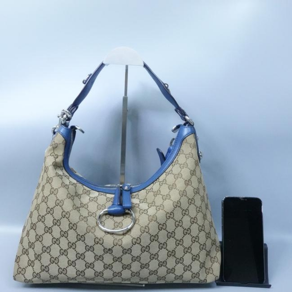PRE LOVED AUTHENTIC GUCCI LOGO  HOBO BAG, Vintage.